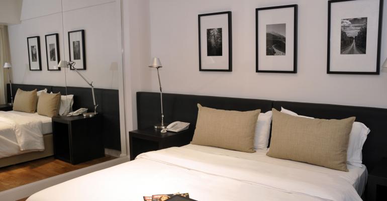 Habitación junior triple - Principado Downtown Hotel